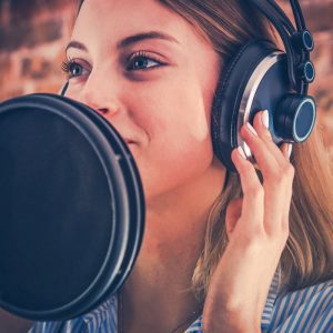 Woman creating a voiceover for videos