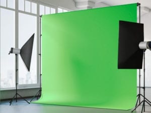 Green screen backdrop shown for video